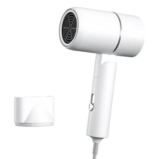 White hair dryer with nozzle attachment on a white background