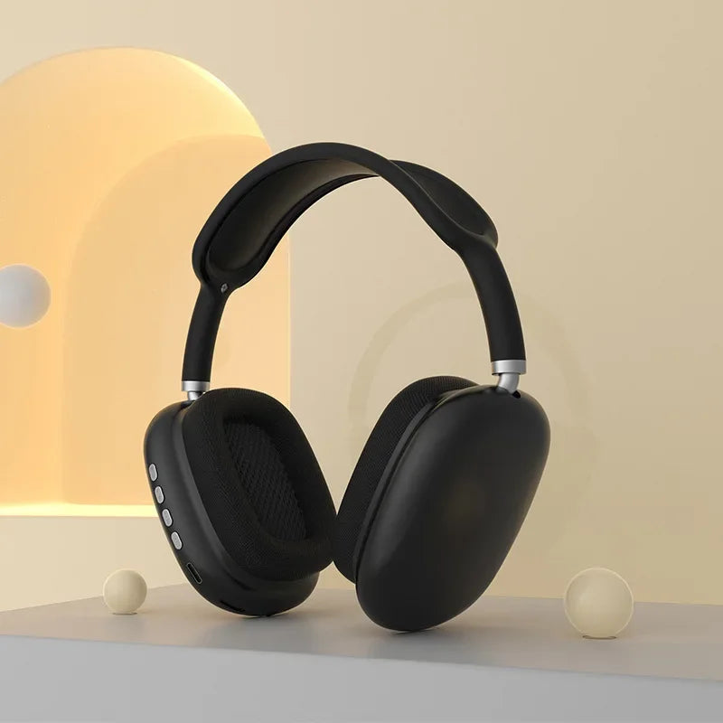 Black headphones on a neutral background