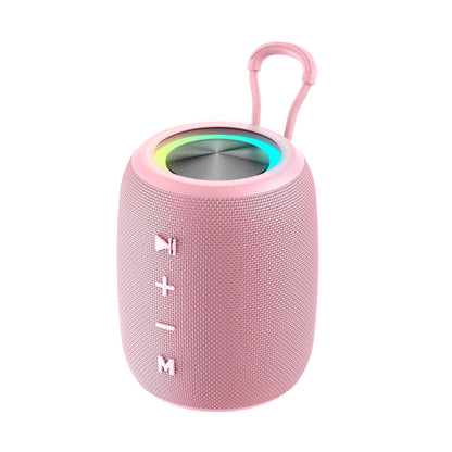 Pink portable speaker with a handle on a white background