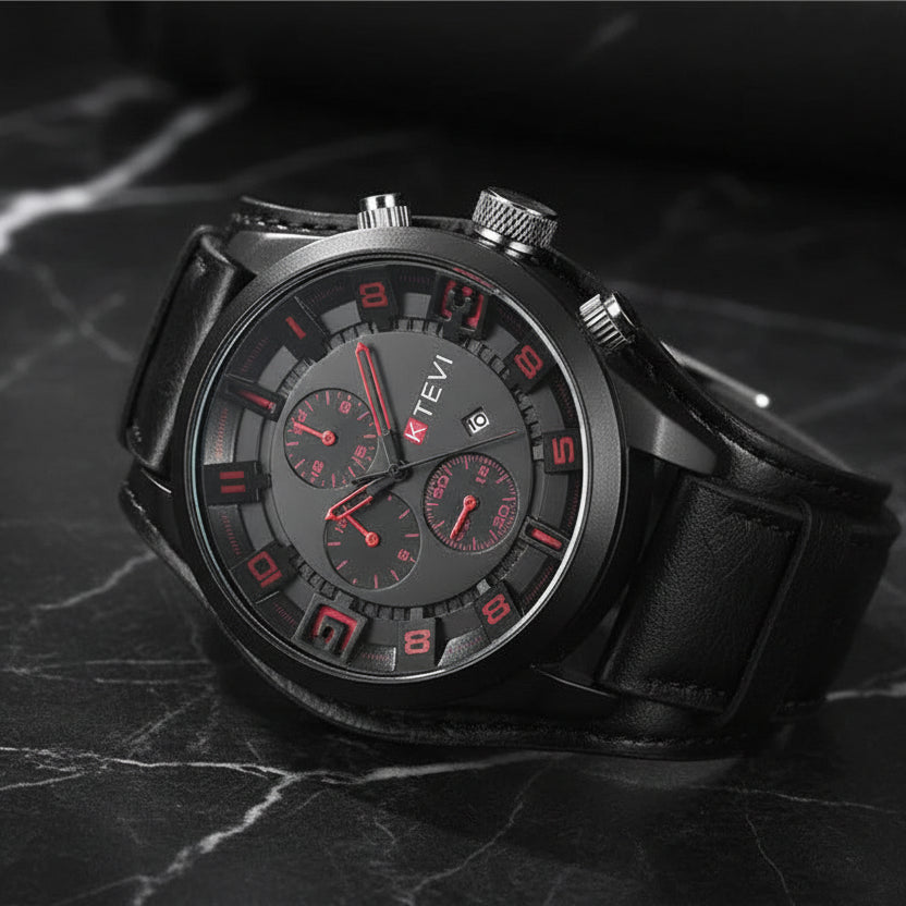 Black wristwatch with red accents on a textured black background