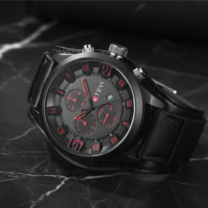 Black wristwatch with red accents on a textured black background