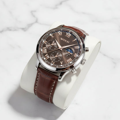 Luxury watch with brown leather strap and detailed face on a light blue background