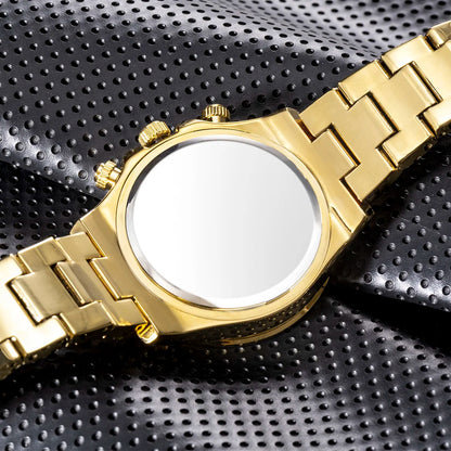 Gold watch with a white face on a black textured background