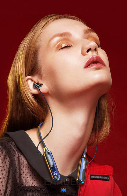 Woman wearing wireless earbuds with a red background