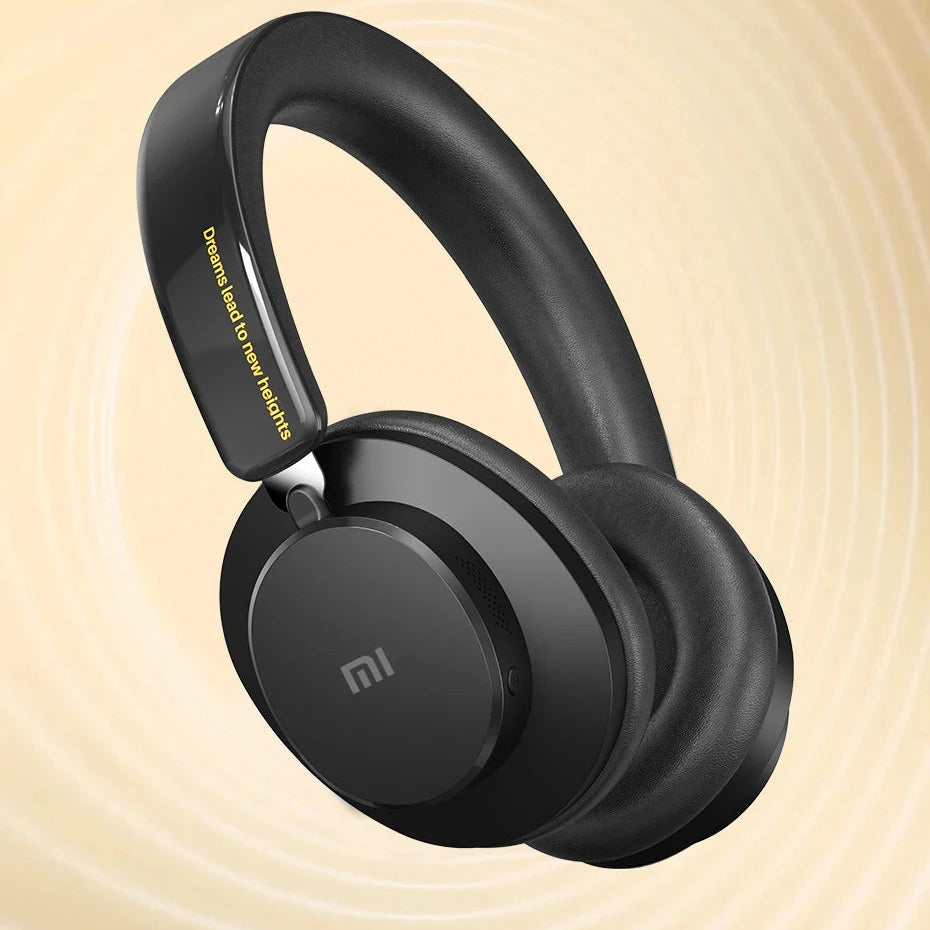 Black headphones with 'Exceptional Audio Extraordinary Effects' text on a beige background