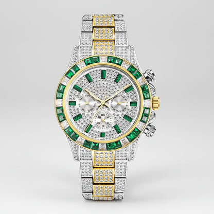 Luxury watch with green gemstones and gold accents on a white background