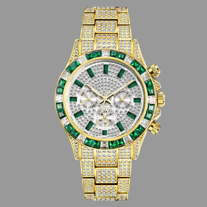 Luxury gold watch with green gemstones on a white background
