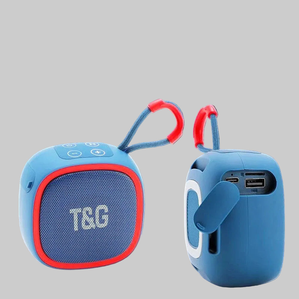 Portable outdoor Bluetooth speaker with red accents on a blue background