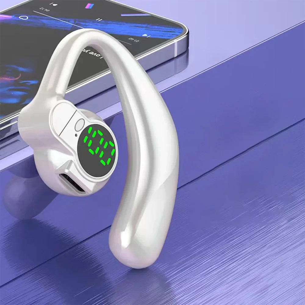 White Bluetooth earbud with digital display on a reflective purple surface