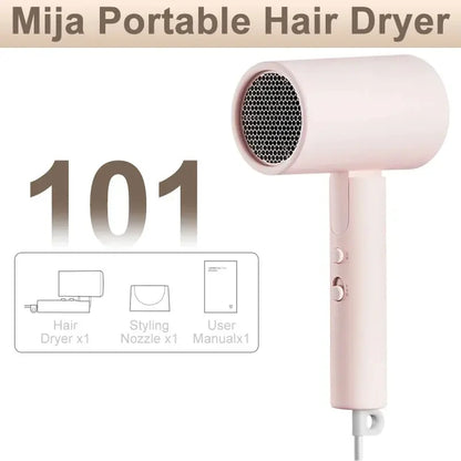 Mija Portable Hair Dryer with packaging showing hair dryer, nozzle, and user manual on a white background.