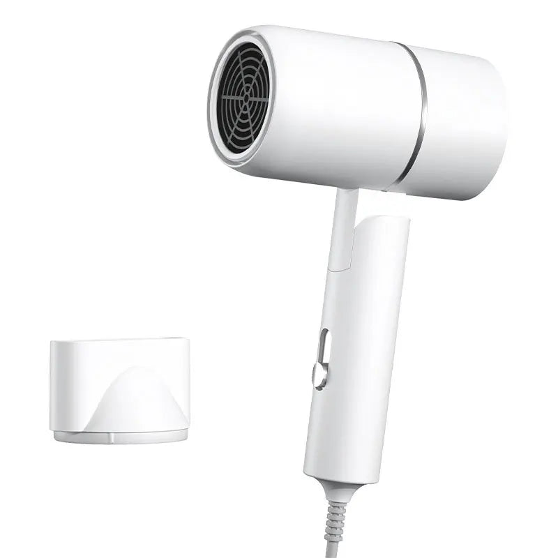 White hair dryer with nozzle attachment on a white background