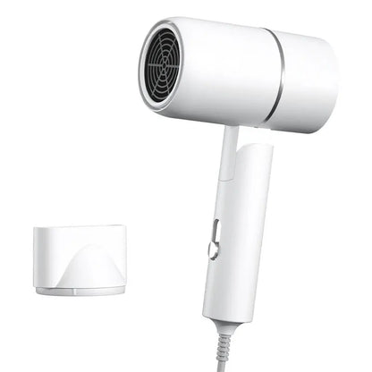 White hair dryer with nozzle attachment on a white background