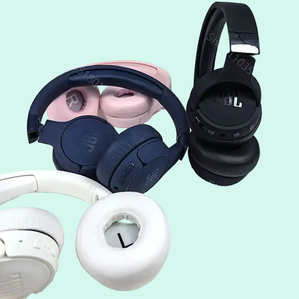 Three pairs of headphones in black, blue, and white on a light gray background