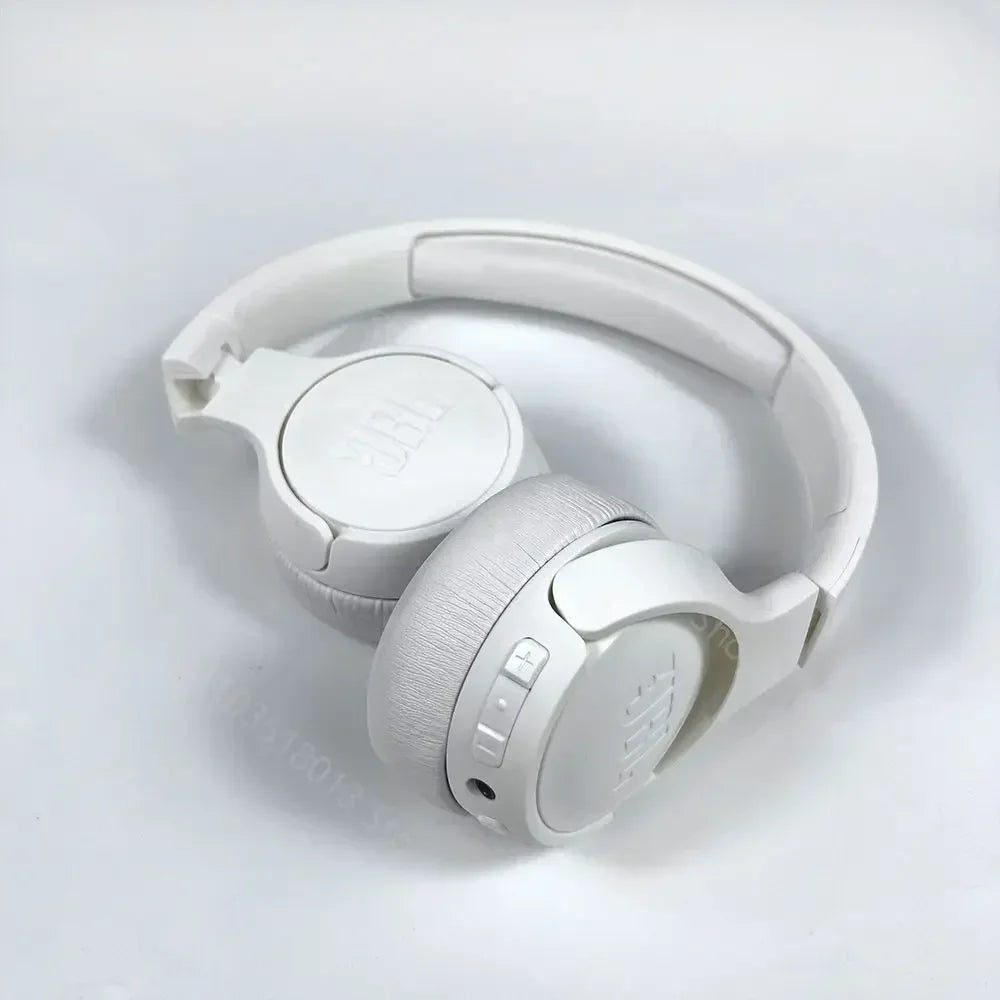White headphones on a light gray background