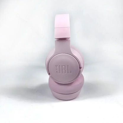Pink JBL headphones on a white background