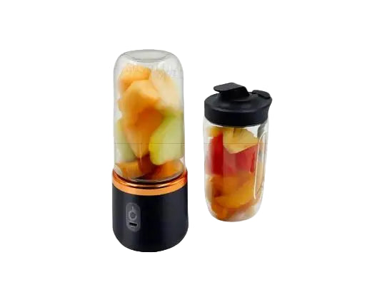 Portable blender with fruits inside on a white background