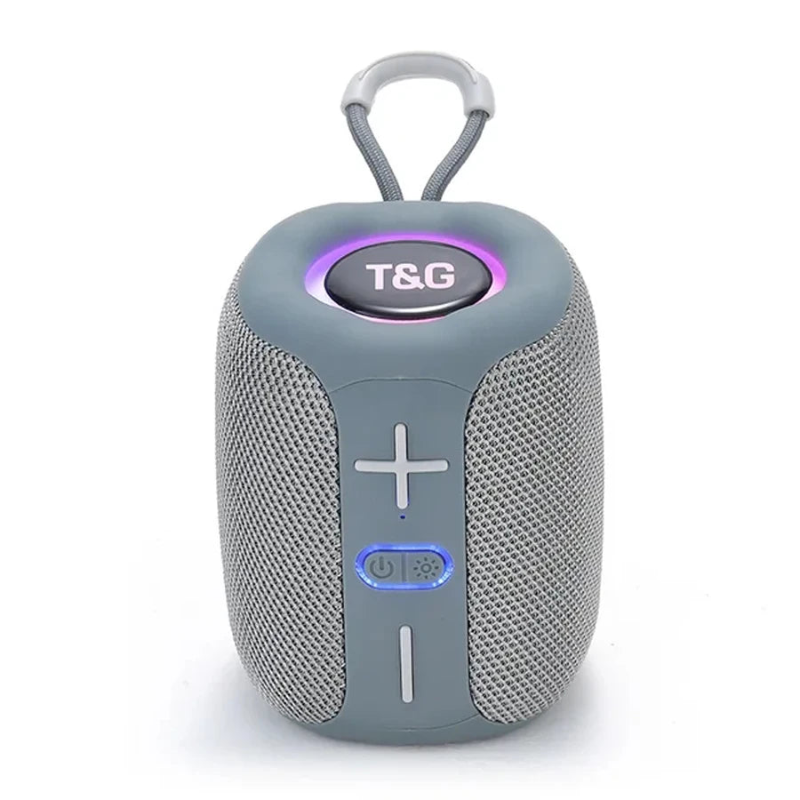 Gray portable speaker with T&G branding on a white background