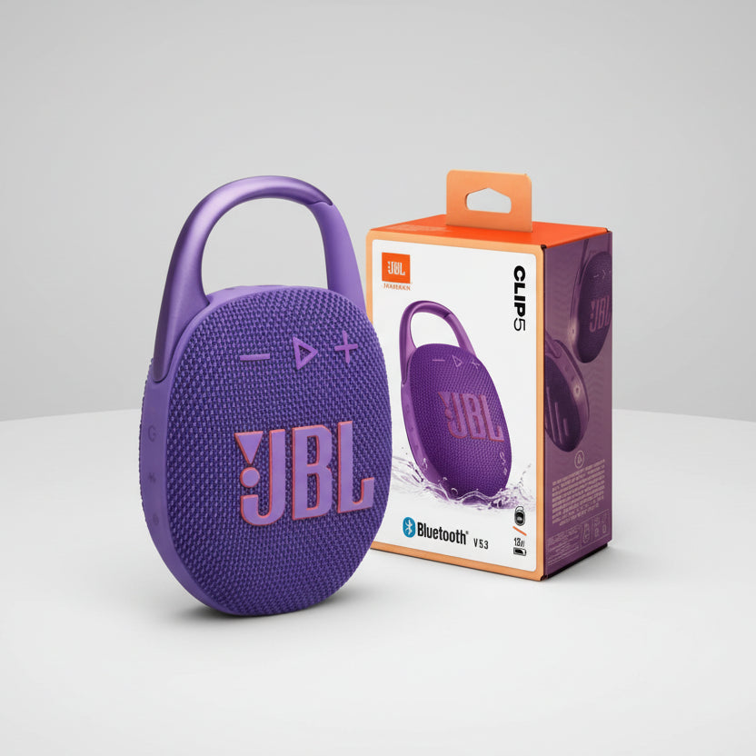 Purple JBL speaker with packaging on a white background