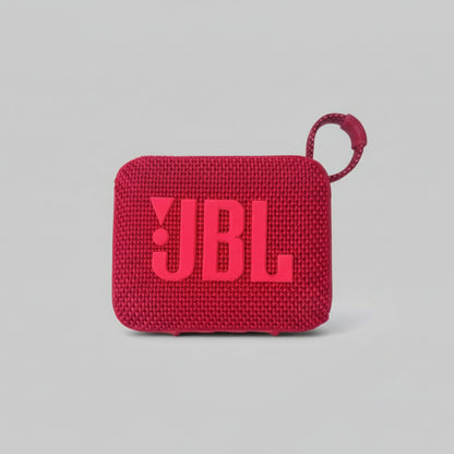 Red JBL portable speaker on a white background