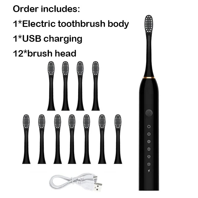 Black electric toothbrush with USB charging cable and multiple brush heads on a white background.